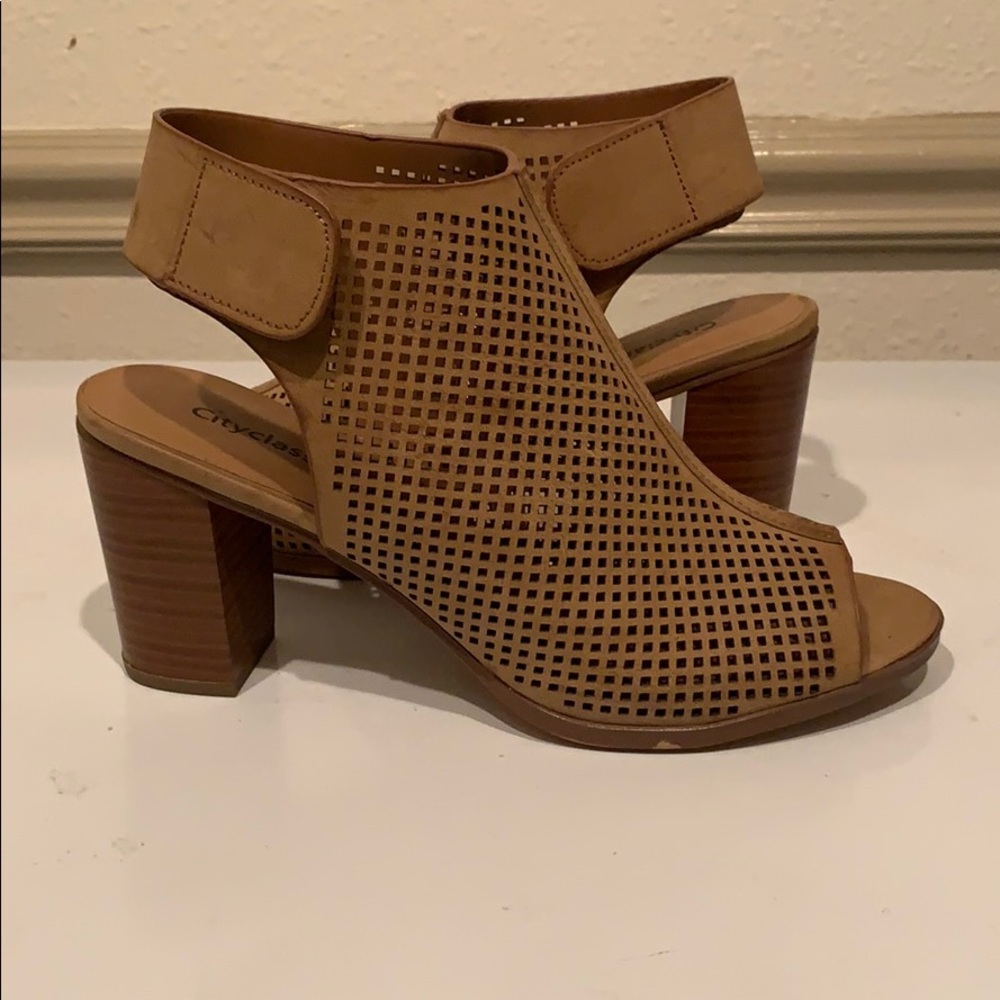 Slip on peek a boo heel